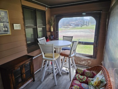 Check out this 3 bedroom, 2 and half bath year round getaway in on Jack O Lantern Resort in New Hampshire - for sale on GolfHomes.com, golf home, golf lot