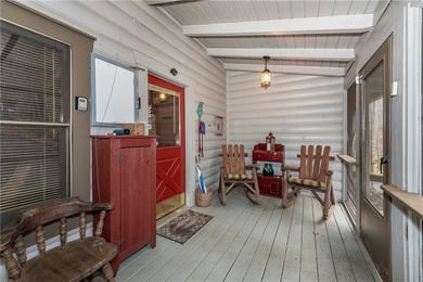 Log Cabin on Creek Frontage at the End of a Quiet Cul-de-Sac - on Bent Tree Golf Course in Georgia - for sale on GolfHomes.com, golf home, golf lot