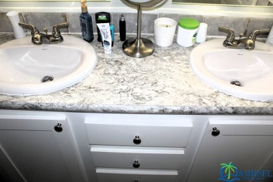 Move right in and start living the dream! This fully turnkey on Cypresswood Golf and Country Club in Florida - for sale on GolfHomes.com, golf home, golf lot