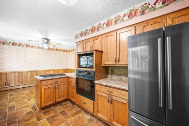 Don't miss this well maintained brick ranch with many features on Prairie Vista Golf Course in Illinois - for sale on GolfHomes.com, golf home, golf lot