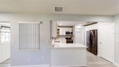 Spacious 2/2 Montgomery Model Villa with 2-Car Garage in on On Top of the World Golf Course in Florida - for sale on GolfHomes.com, golf home, golf lot