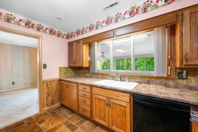 Don't miss this well maintained brick ranch with many features on Prairie Vista Golf Course in Illinois - for sale on GolfHomes.com, golf home, golf lot