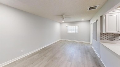 Spacious 2/2 Montgomery Model Villa with 2-Car Garage in on On Top of the World Golf Course in Florida - for sale on GolfHomes.com, golf home, golf lot