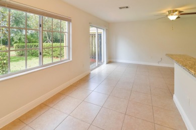 Spacious 3BR/2.5BA two-story townhome in Green Cay Village with on Westchester Golf and Country Club in Florida - for sale on GolfHomes.com, golf home, golf lot