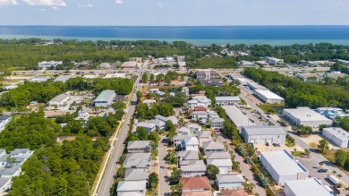 Welcome to 'Knee Deep,' an exquisite 4-bedroom, 3 and 1/2 on Seascape Golf Course in Florida - for sale on GolfHomes.com, golf home, golf lot