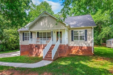Fully updated in 2025 from top to bottom, this stunning 3BR/2BA on Lake Louise Golf Club in North Carolina - for sale on GolfHomes.com, golf home, golf lot