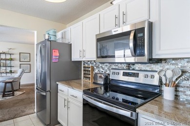 Welcome to 488 Regatta Bay Circle #2C-refreshed and ready for on Seasons Ridge At Four Seasons in Missouri - for sale on GolfHomes.com, golf home, golf lot