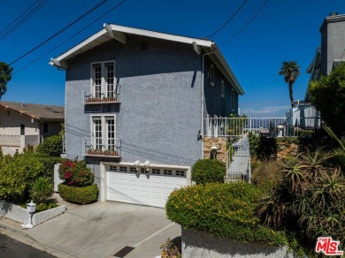 This exceptionally rare two-story view home is on the market for on Woodland Hills Country Club in California - for sale on GolfHomes.com, golf home, golf lot