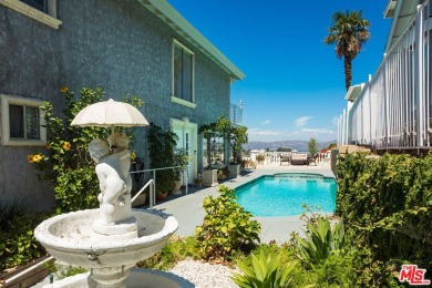 This exceptionally rare two-story view home is on the market for on Woodland Hills Country Club in California - for sale on GolfHomes.com, golf home, golf lot