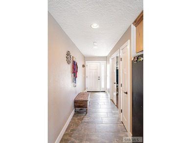 This spacious home offers 4 bedrooms, 3 full bathrooms, and a on  in ID - for sale on GolfHomes.com, golf home, golf lot