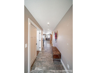 This spacious home offers 4 bedrooms, 3 full bathrooms, and a on  in ID - for sale on GolfHomes.com, golf home, golf lot