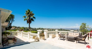 This exceptionally rare two-story view home is on the market for on Woodland Hills Country Club in California - for sale on GolfHomes.com, golf home, golf lot