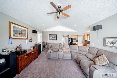 This spacious home offers 4 bedrooms, 3 full bathrooms, and a on  in ID - for sale on GolfHomes.com, golf home, golf lot