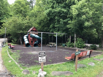 VACANT RV Lot in the sought after Outdoor Resorts at Gatlinburg on Bent Creek Golf Course in Tennessee - for sale on GolfHomes.com, golf home, golf lot