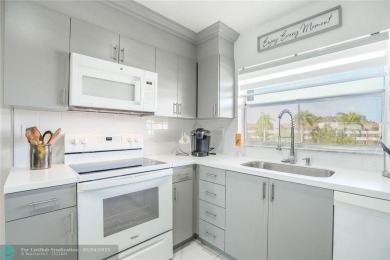 Welcome to your bright and airy 2-bedroom, 2-bathroom condo in on Sunrise Lakes Phase III in Florida - for sale on GolfHomes.com, golf home, golf lot