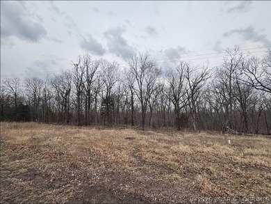 Build your Lake lifestyle here! This lot offers 98 ft of road on The Club At Porto Cima in Missouri - for sale on GolfHomes.com, golf home, golf lot