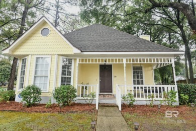 This charming single-story cottage features 3 bedrooms and 2 on Lake Forest Yacht and Country Club in Alabama - for sale on GolfHomes.com, golf home, golf lot