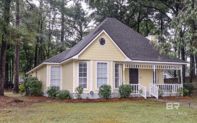 This charming single-story cottage features 3 bedrooms and 2 on Lake Forest Yacht and Country Club in Alabama - for sale on GolfHomes.com, golf home, golf lot