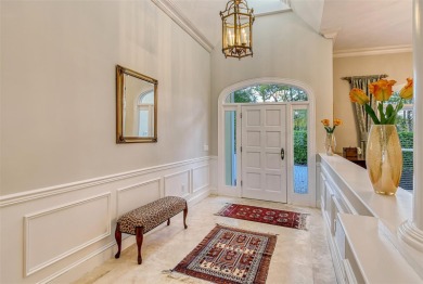 PRIVACY ABOUNDS IN THIS COMPLETELY UPDATED HOME W/NEWER ROOF on The Oaks Club in Florida - for sale on GolfHomes.com, golf home, golf lot