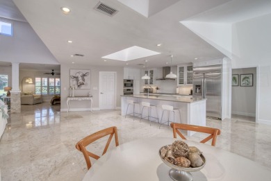 Step into recently renovated and impeccably designed 4-bedroom on PGA National Golf Club in Florida - for sale on GolfHomes.com, golf home, golf lot