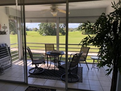 ***Charming and inviting 2nd floor unit offering a peaceful view on  in Florida - for sale on GolfHomes.com, golf home, golf lot