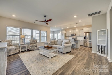 This stunning home in the sought-after Edgewater community is on Edgewater Golf Club in South Carolina - for sale on GolfHomes.com, golf home, golf lot