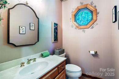 Tucked away in the sought-after community of Kenmure, this home on Kenmure Country Club in North Carolina - for sale on GolfHomes.com, golf home, golf lot
