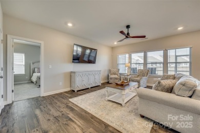 This stunning home in the sought-after Edgewater community is on Edgewater Golf Club in South Carolina - for sale on GolfHomes.com, golf home, golf lot