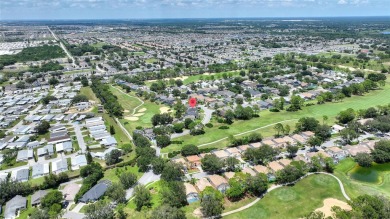 NEW ROOF!!! Fall in Love with this captivating 4 bedroom, 3 bath on Southern Dunes Golf and Country Club in Florida - for sale on GolfHomes.com, golf home, golf lot