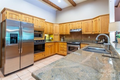 Tucked away in the sought-after community of Kenmure, this home on Kenmure Country Club in North Carolina - for sale on GolfHomes.com, golf home, golf lot