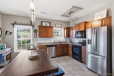 Imagine yourself in this Condo in the sought-after Copper Falls on Osage National Golf Club in Missouri - for sale on GolfHomes.com, golf home, golf lot