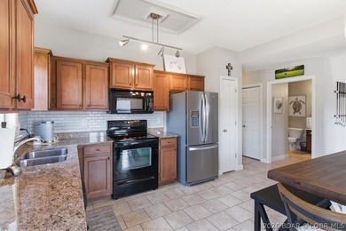 Imagine yourself in this Condo in the sought-after Copper Falls on Osage National Golf Club in Missouri - for sale on GolfHomes.com, golf home, golf lot