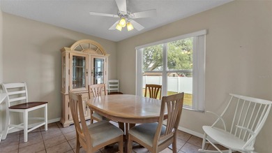 Well-maintained home featuring carpet flooring and a comfortable on Sandpiper Golf Club in Florida - for sale on GolfHomes.com, golf home, golf lot