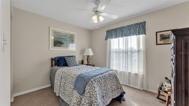 Well-maintained home featuring carpet flooring and a comfortable on Sandpiper Golf Club in Florida - for sale on GolfHomes.com, golf home, golf lot