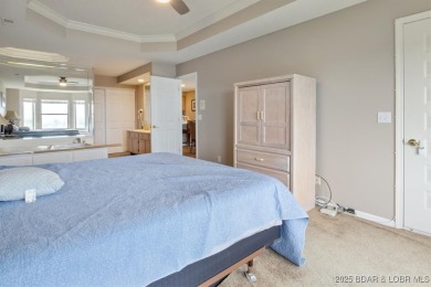 Welcome to this beautiful duplex-style condominium in the on Seasons Ridge At Four Seasons in Missouri - for sale on GolfHomes.com, golf home, golf lot