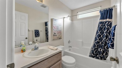 Well-maintained home featuring carpet flooring and a comfortable on Sandpiper Golf Club in Florida - for sale on GolfHomes.com, golf home, golf lot