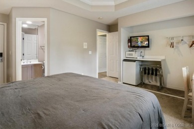 Welcome to this beautiful duplex-style condominium in the on Seasons Ridge At Four Seasons in Missouri - for sale on GolfHomes.com, golf home, golf lot