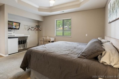 Welcome to this beautiful duplex-style condominium in the on Seasons Ridge At Four Seasons in Missouri - for sale on GolfHomes.com, golf home, golf lot