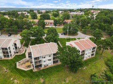 Welcome to this beautiful duplex-style condominium in the on Seasons Ridge At Four Seasons in Missouri - for sale on GolfHomes.com, golf home, golf lot