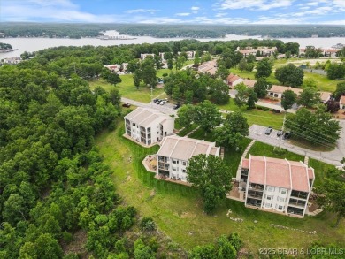 Welcome to this beautiful duplex-style condominium in the on Seasons Ridge At Four Seasons in Missouri - for sale on GolfHomes.com, golf home, golf lot