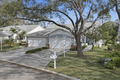 This move-in ready 2-bedroom, 2-bath Hibiscus model villa--with on University Park Country Club in Florida - for sale on GolfHomes.com, golf home, golf lot