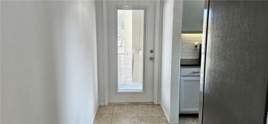 Come see this light, bright & airy renovated 2 bedroom-2 bath on The American Golf Club in Florida - for sale on GolfHomes.com, golf home, golf lot