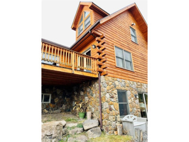 Custom built log home hitting the market for the first time! on Fairmont Hot Springs Resort in Montana - for sale on GolfHomes.com, golf home, golf lot