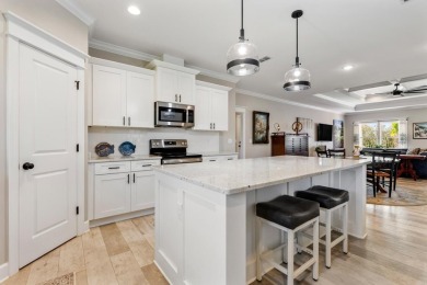 Experience the best of coastal living in this impeccable fully on St. James Bay in Florida - for sale on GolfHomes.com, golf home, golf lot