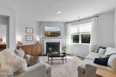 Nestled in the highly sought-after Brunswick Forest community on Cape Fear National At Brunswick Forest in North Carolina - for sale on GolfHomes.com, golf home, golf lot