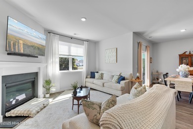 Nestled in the highly sought-after Brunswick Forest community on Cape Fear National At Brunswick Forest in North Carolina - for sale on GolfHomes.com, golf home, golf lot