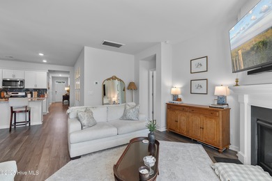 Nestled in the highly sought-after Brunswick Forest community on Cape Fear National At Brunswick Forest in North Carolina - for sale on GolfHomes.com, golf home, golf lot