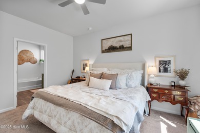 Nestled in the highly sought-after Brunswick Forest community on Cape Fear National At Brunswick Forest in North Carolina - for sale on GolfHomes.com, golf home, golf lot