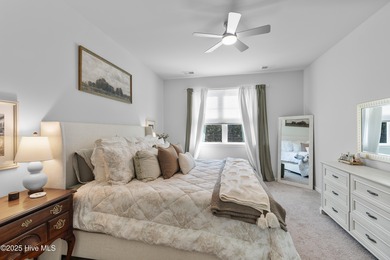 Nestled in the highly sought-after Brunswick Forest community on Cape Fear National At Brunswick Forest in North Carolina - for sale on GolfHomes.com, golf home, golf lot