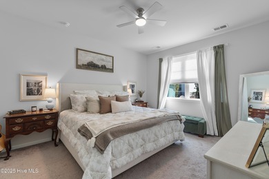 Nestled in the highly sought-after Brunswick Forest community on Cape Fear National At Brunswick Forest in North Carolina - for sale on GolfHomes.com, golf home, golf lot